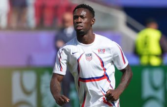 UEFA blasts FIFA over Balogun suspension reversal United States of America forward Folarin Balogun (20) warms up before a Round of 32 match of the 2026 FIFA World Cup against Bosnia and Herzegovina at San Francisco Bay Area Stadium.